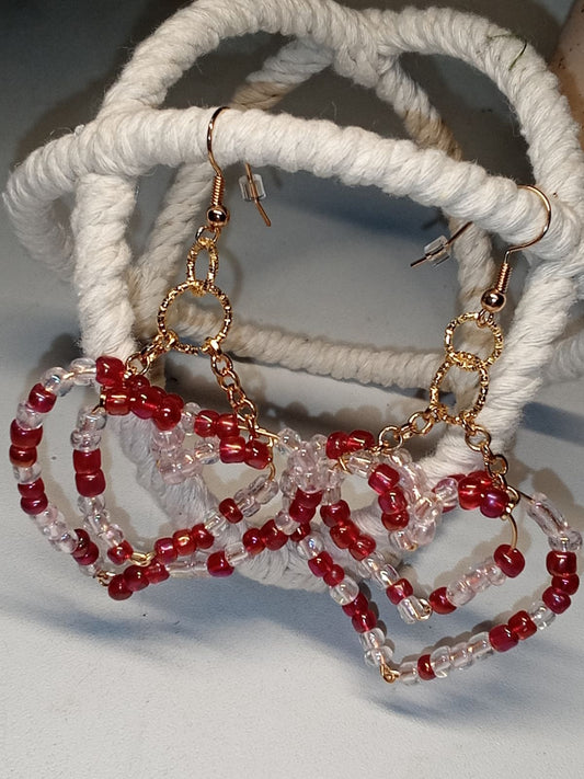 Super cute heart shaped on Golden wire with double rings and chain.Gold tone french ear wires.